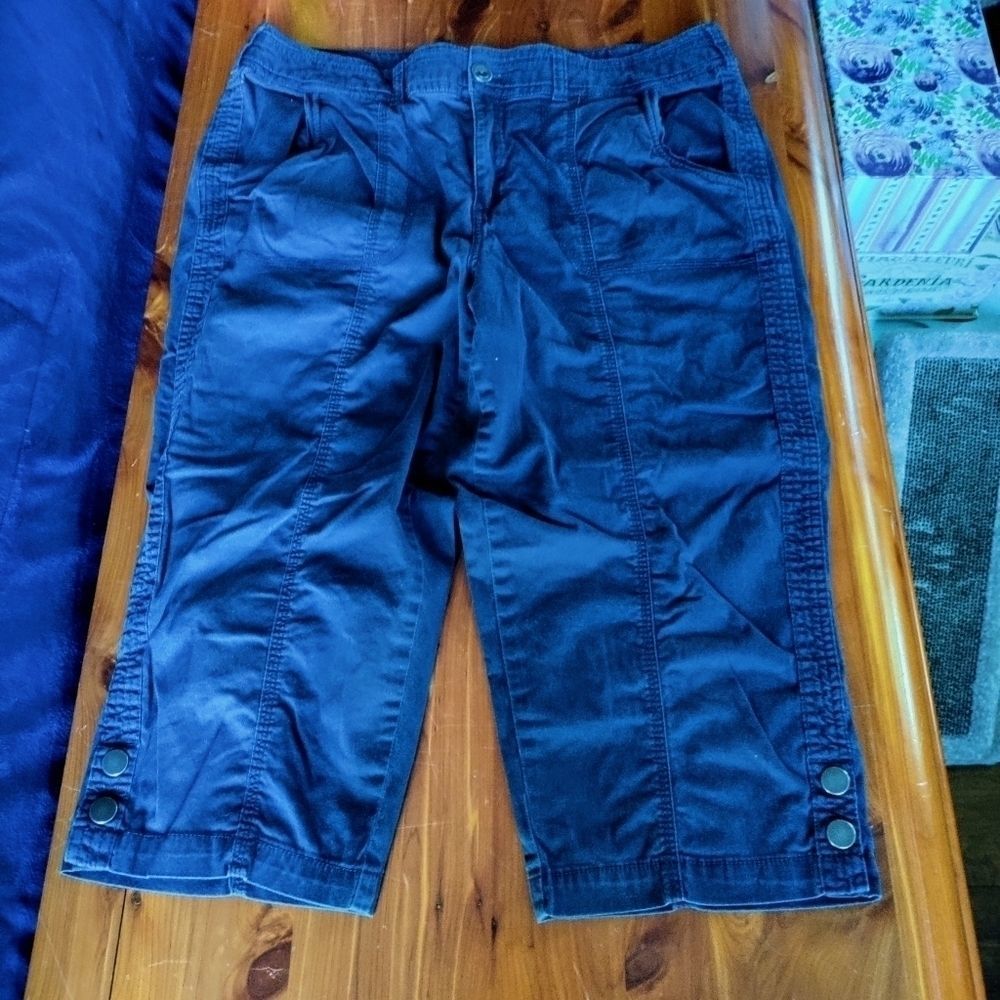 Blue navy capris with buttons on the bottoms and front and rear pockets